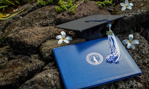 Commencement diploma and hat