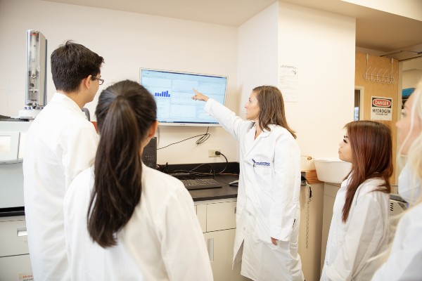 Dr. Kate Perrault teaching her forensic science students