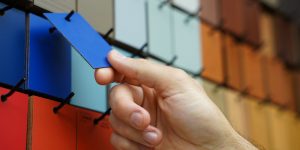 An E+ID student looks at color swatches