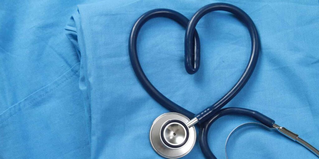 Doctor coat with stethoscope shaped as a heart