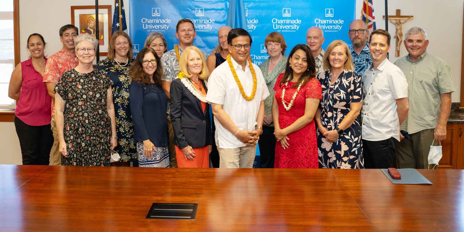 Nikhil Seth, Executive Director of UNITAR, and the Chaminade leadership team posing for a photo