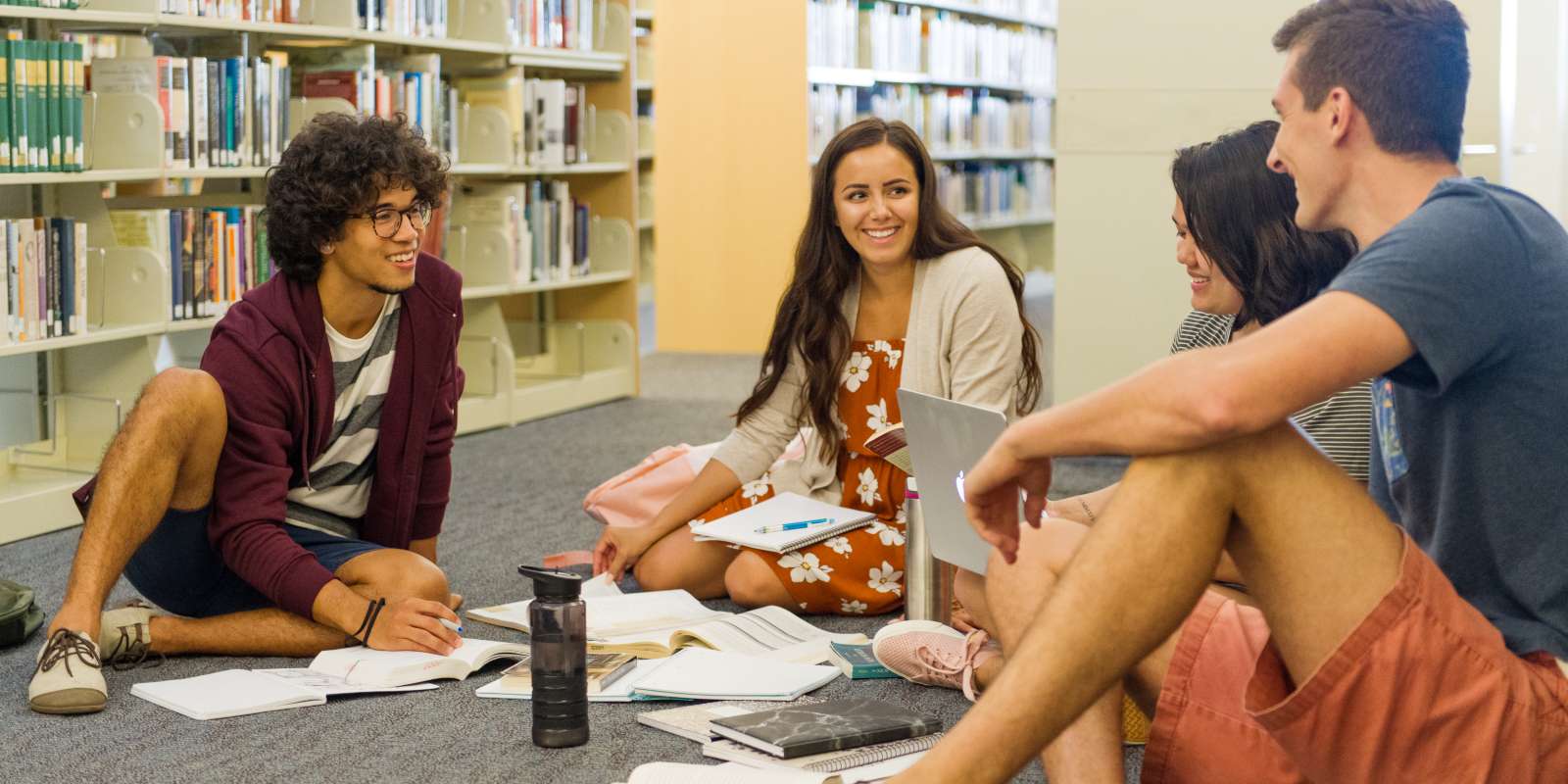 Chaminade students doing a group project in the Sullivan Family Library