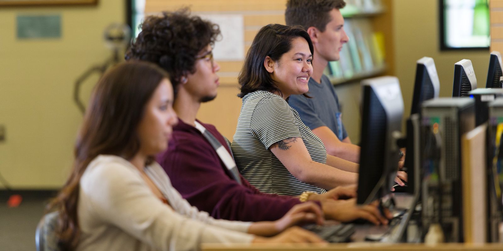 Students using the computers in the Sullivan Family Library