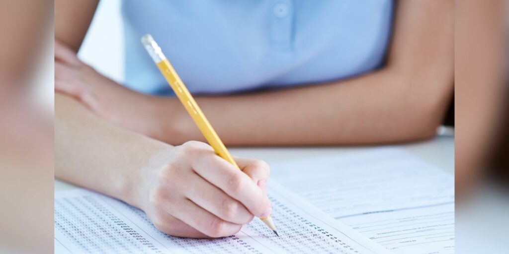 student taking an exam