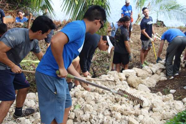 students at Heeia participating in community service