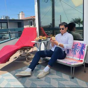 Jacob Fernandez holds a bar of Brossentia soap on the deck of his Hermosa Beach home.