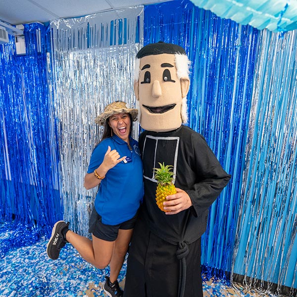 student with Fr. Chami