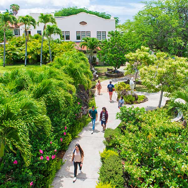 students walking across campus