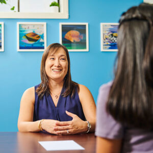 financial aid counselor speaking with a student